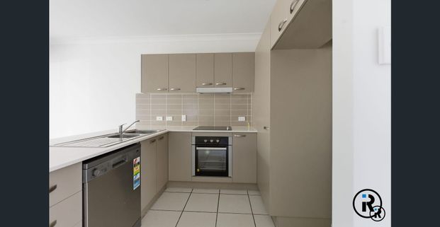 Secure, Modern & Ultra Convenient — Your Perfect Bundamba Townhouse - Photo 1