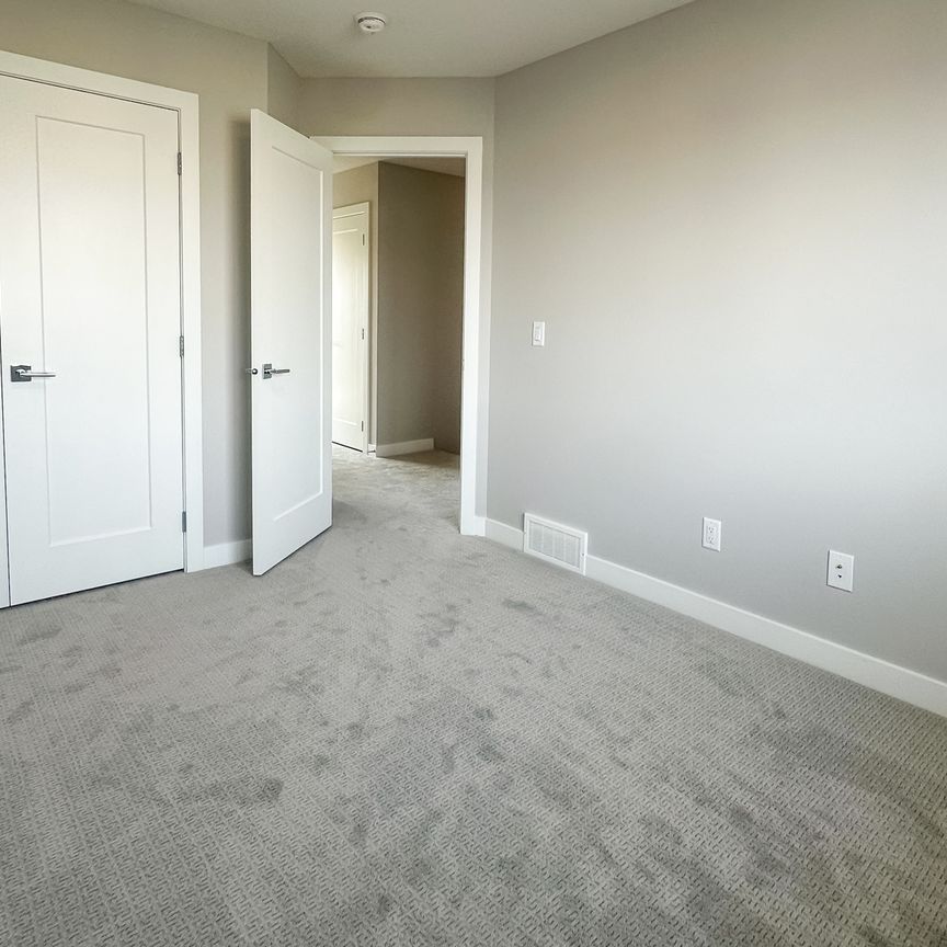 Stunning Brand New Duplex In Chestermere – Modern Living With Ample Space - Photo 1