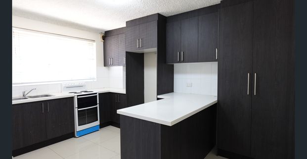 SHOPS ACROSS THE ROAD - Photo 1