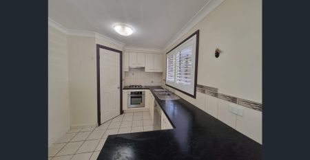 Charming Family Home in Emerald Beach - Photo 4