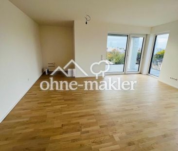 Helle und hochwertige Neubauwohnung mit großem Balkon - Foto 1