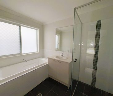 BREAK LEASE - Modern 4-Bedroom Home in Sought-After Gainsborough Gr... - Photo 5