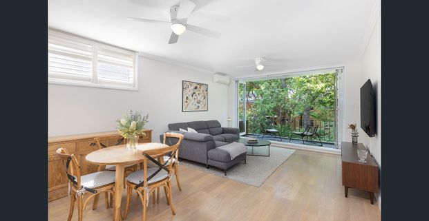 Full brick apartment basks in tranquil leafy backdrop - Photo 1