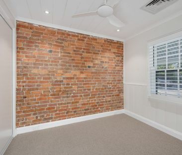 Executive Living at Its Finest - Renovated Two-Bedroom Cottage - Photo 2