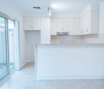 Spacious 3-Bedroom Home in a Convenient Brooklyn Park Location - Photo 6