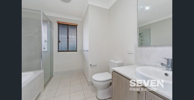 Spacious Family Haven in a Peaceful Neighbourhood - Photo 1