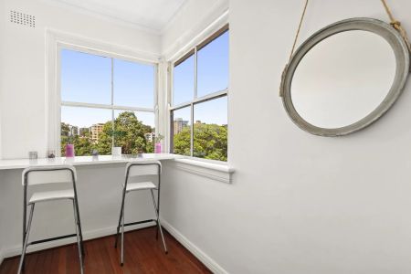 Partly Furnished 2-Bedroom Apartment with Sunroom - Photo 2