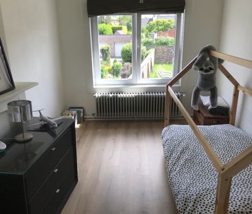 Gezellige rijwoning met 3 slaapkamers en tuin! - Foto 1