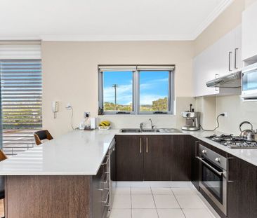 Spacious, Modern & Perfectly Positioned - Photo 1