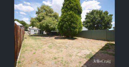 Home In super central location! - Photo 2