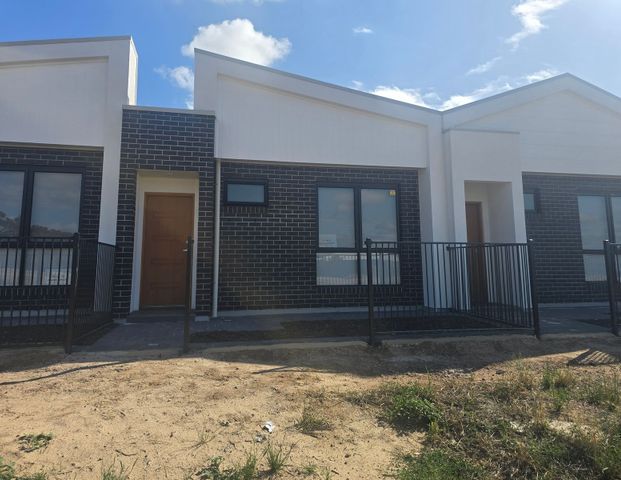 Brand-new, stylish, and perfectly located! - Photo 1