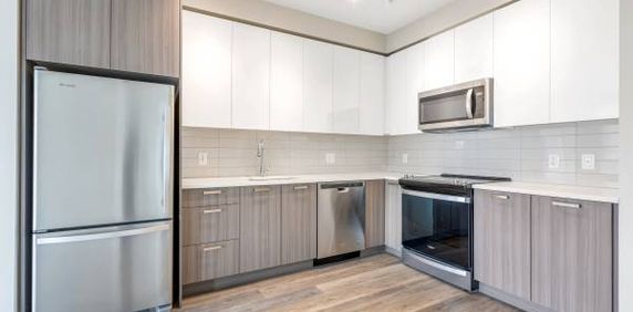 2 Bed + 2 Bath + Den suite @ River District! **1-month free rent!** - Photo 2