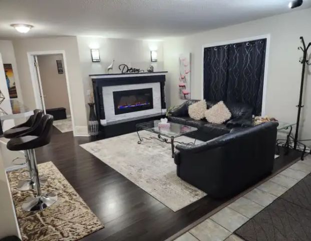 Furnished 2 Bed Legal Walkout Suite – Arbour Lake NW – $1,499 + Utilities | 89 Arbour Stone Rise Northwest, Calgary - Photo 1
