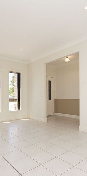 A perfect family home in heart of Harkness - Photo 1