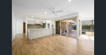 A spacious, family-friendly 4-bedroom home offering comfort and convenience in a prime Parkwood position. - Photo 5