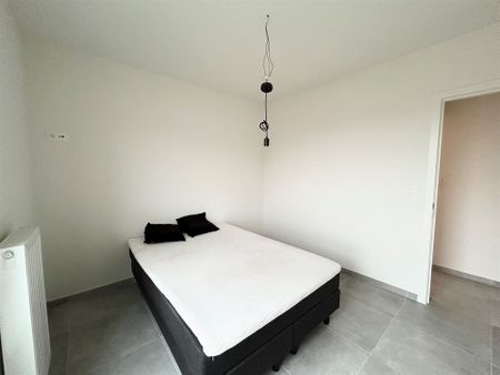 Leuk 2 slpk-appartement met autostaanplaats en terras! - Photo 2