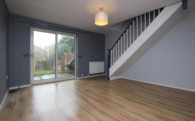 A two bedroom unfurnished mid-terrace house in Bradley Stoke with parking, rear garden and downstairs WC. Available in November on an unfurnished basis. - Photo 1