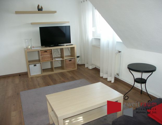Wüste, modern möblierte Dachgeschosswohnung, fußnah zur City gelegen. - Foto 1