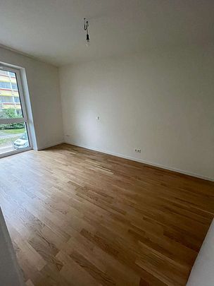 KfW 40-Neubau-Wohnung mit EBK, Balkon, Echtholzparkett, HWR, Fahrstuhl, Tiefgarage - Foto 1