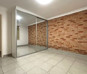 Superb Three-Bedroom Villa in Prestigious Bossley Park - Photo 6