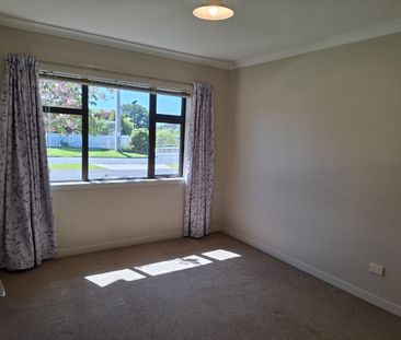 Discover comfort and convenience in this four-bedroom, two-bathroom... - Photo 2