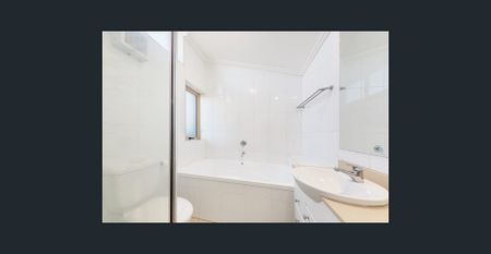 Modern Comfort Meets Coastal Convenience—Discover This Spacious 3-Bedroom Apartment - Photo 3