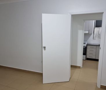 Spacious 1 bedroom Double-Storey Home - House-style living with uni... - Photo 4