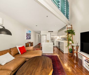 Stylish, Light-Filled Apartment with High Ceilings & Flexible Living - Photo 6