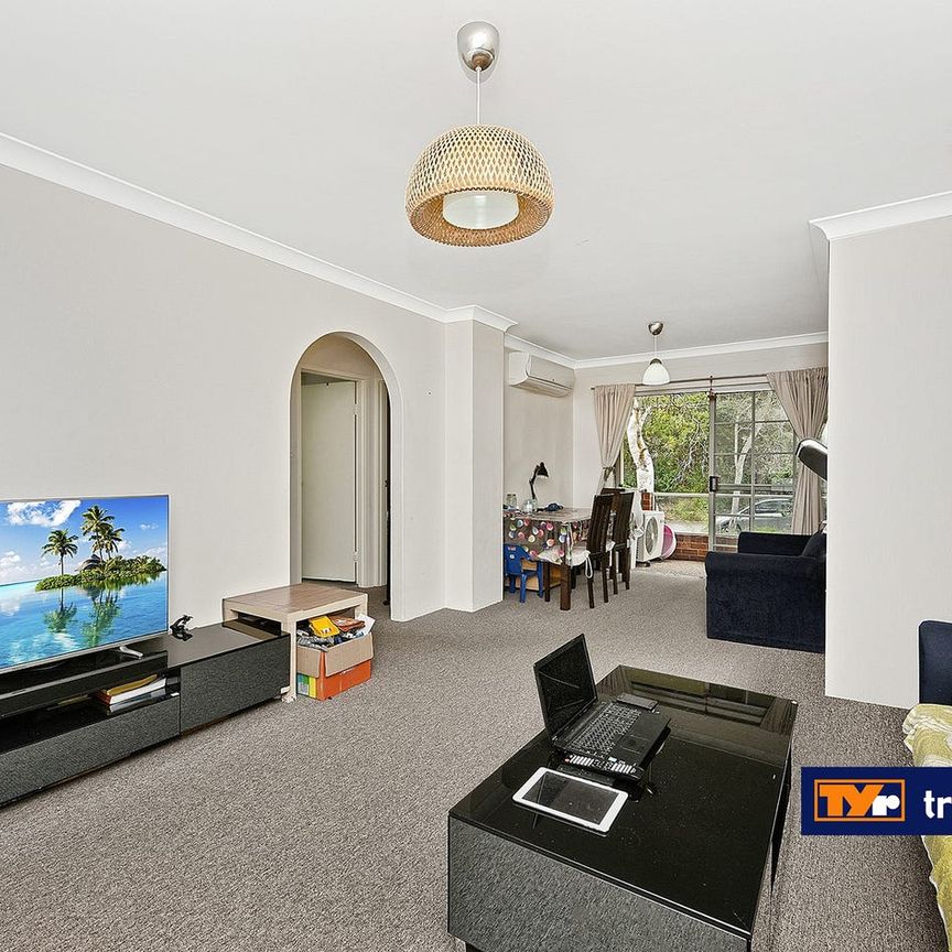 Air-conditioned 2 bedroom unit with spacious bedrooms on Level 1 - Photo 1