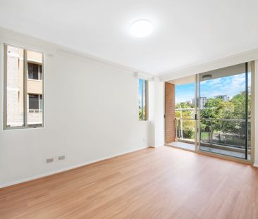 Freshly Renovated Two-Bedroom Apartment with Resort-Style Facilities - Photo 1