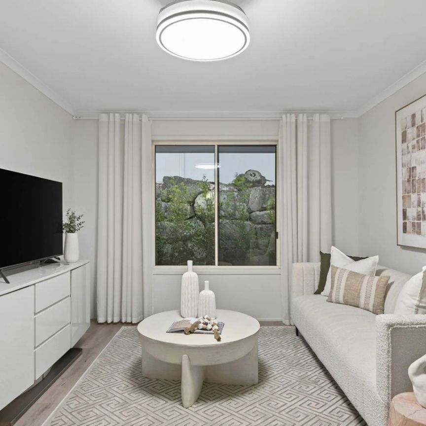 A stylish newly renovated home in one of Wishart's most sought-after pockets, perfectly positioned for families in Mansfield State School Catchment. - Photo 1