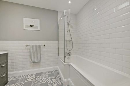 This versatile bungalow includes three bedrooms, principal with dressing room and ensuite, a stunning open plan kitchen with bi-fold doors, and a garden with a heated studio and WC. - Photo 3