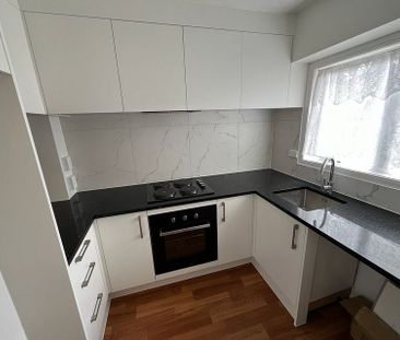 Charming 2BR Unit with Modern Renovations - Photo 5