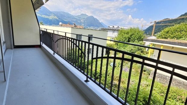 Wohnung mit Weitsicht auf umliegende Berge und Seeblick - Foto 1