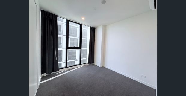 Modern Luxury Living in TRIO | Near-New 2B 2B 1CP Apartment - Photo 1