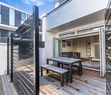 Spacious Terrace Home with Private Courtyard and Two Carparks - Photo 3