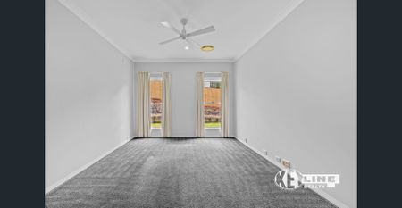 Spacious Four-Bedroom Home with Pool & Multiple Living Areas - Photo 4