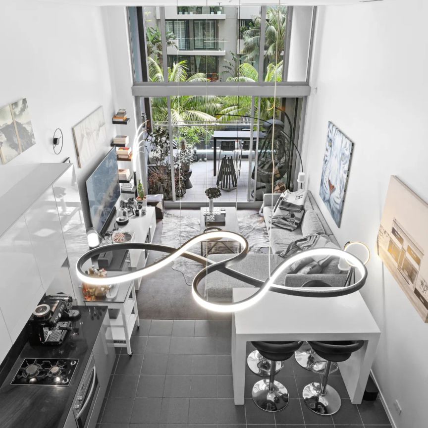 Fully Furnished Luxe Loft Style apartment in the IKON - Photo 1