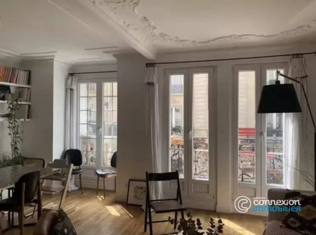 Location AppartementParis 18ème Grandes-Carrières - Photo 3