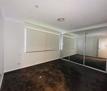 Spacious & Modern Family Home Close to Amenities - Photo 1