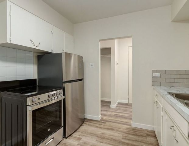 Peyto Apartments | 1028 13 Ave SW, Calgary - Photo 1