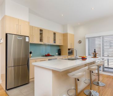 Top Floor Living in a Prime Location - Photo 1
