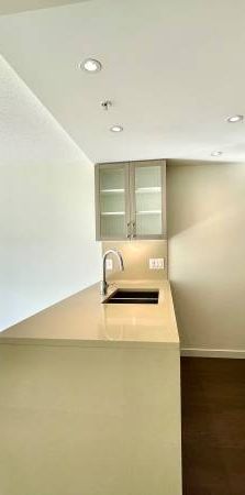 Concrete condo 1 bed+DEN insuite storage with 1 parking - Photo 1