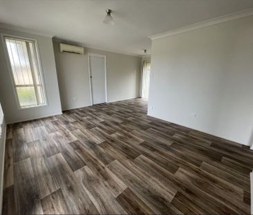 Two Bedroom Unit in Great Location - Photo 4