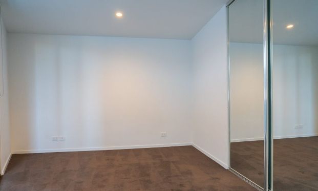 Stylish, Low-Maintenance Living Near the CBD - Photo 1