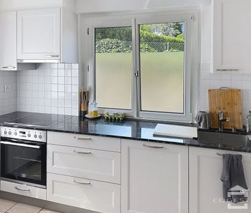 Dans un petit immeuble à Rolle un appartement de 3 pièces au rez-su... - Photo 2