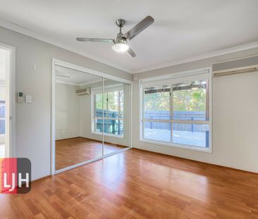 GREAT AIR CONDITIONED FOUR BEDROOM LOW SET HOME! - Photo 1