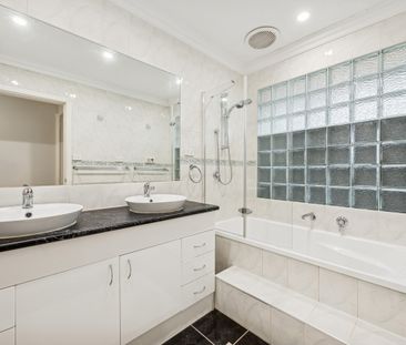 Neat Brick Home with Large Deck and Big Backyard - Photo 2