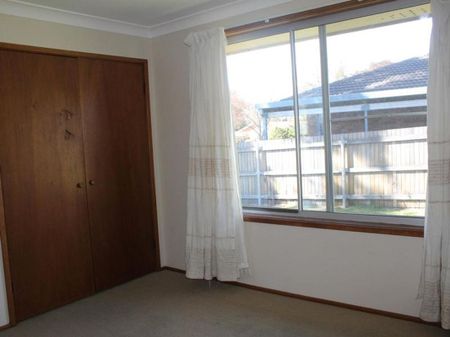 Tidy Two-Bedroom Unit in Peaceful Location - Photo 5