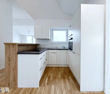 Außergewöhnliche DG-Wohnung mit 4 Terrassen und eigenem Liftzugang! - Photo 1